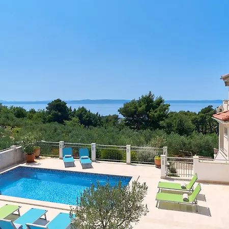 With Two Separate Four-bed Apartments, Private Pool, Grill And Garage *